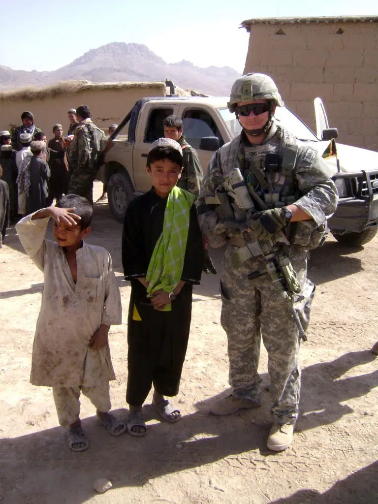 Photo of Joshua Sims local Afghanistan children.